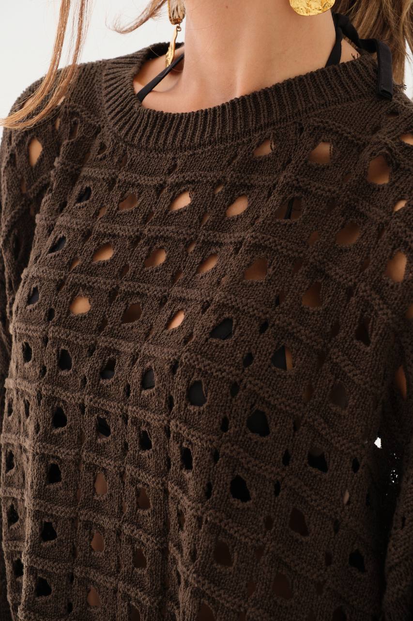 Holes knitted sweater