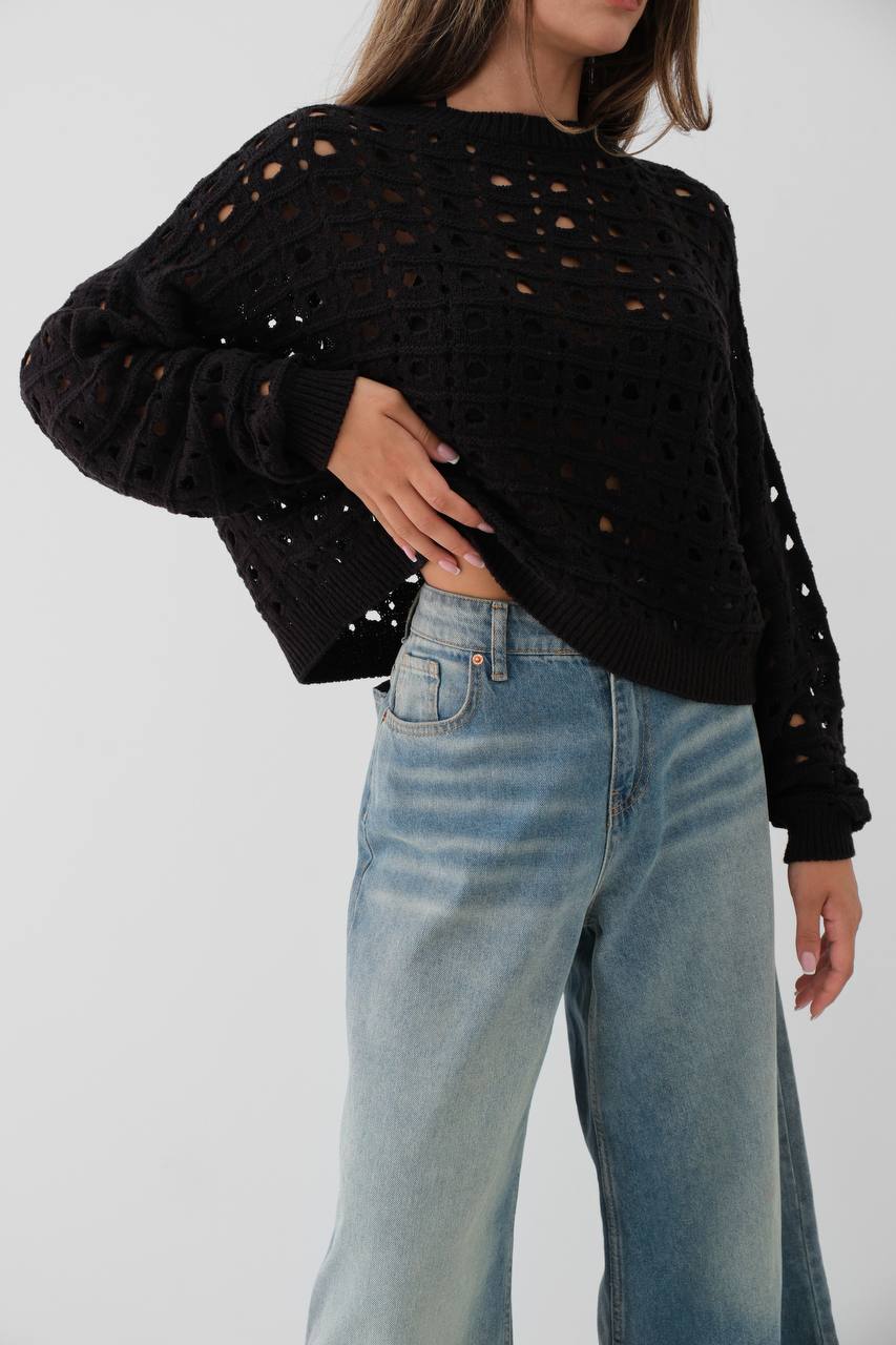 Holes knitted sweater